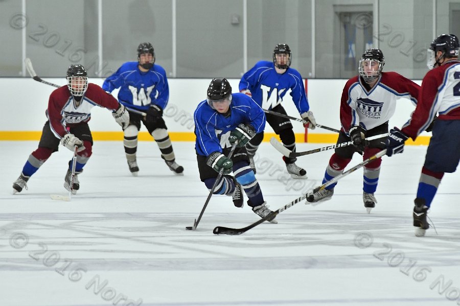 Wheaton College Men\'s Ice Hockey vs Middlesex Community College. - Photo By: KEITH NORDSTROM